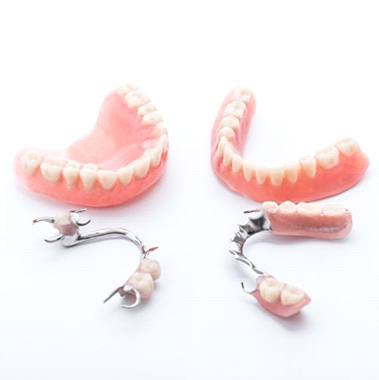 two full dentures and two partials