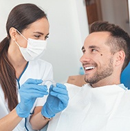 Invisalign dentist in Avon speaking with a patient