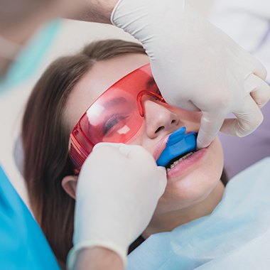 Woman receiving a fluoride treatment