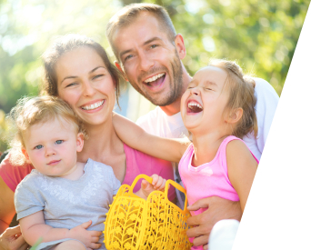Family with healthy smiles after preventive dentistry