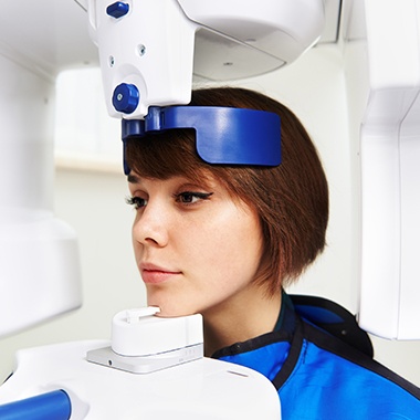 Woman receiving C T Cone beam scans